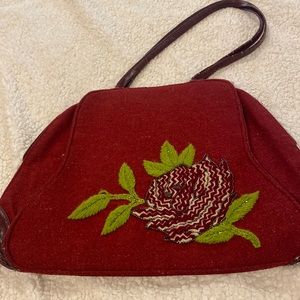 Retro shoulder bag.  Red felt outside with embroidered flower. Red satin lining.